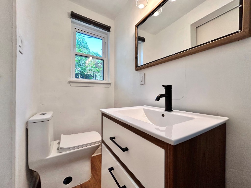 2309 Devonshire Drive, Unit A Austin, TX 78723 - Photo 34 of 39 Bathroom featuring vanity and toilet