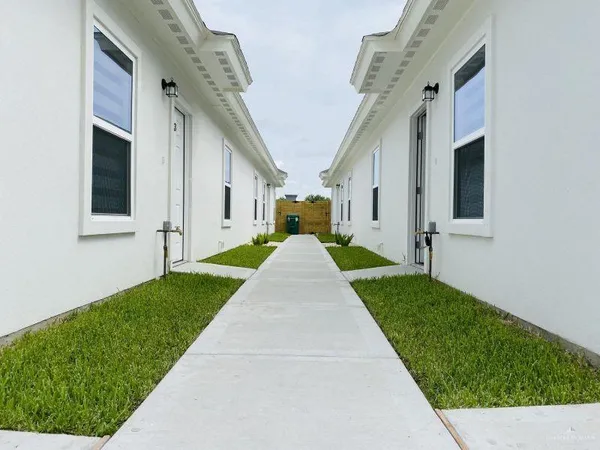 a view of a back yard of the house