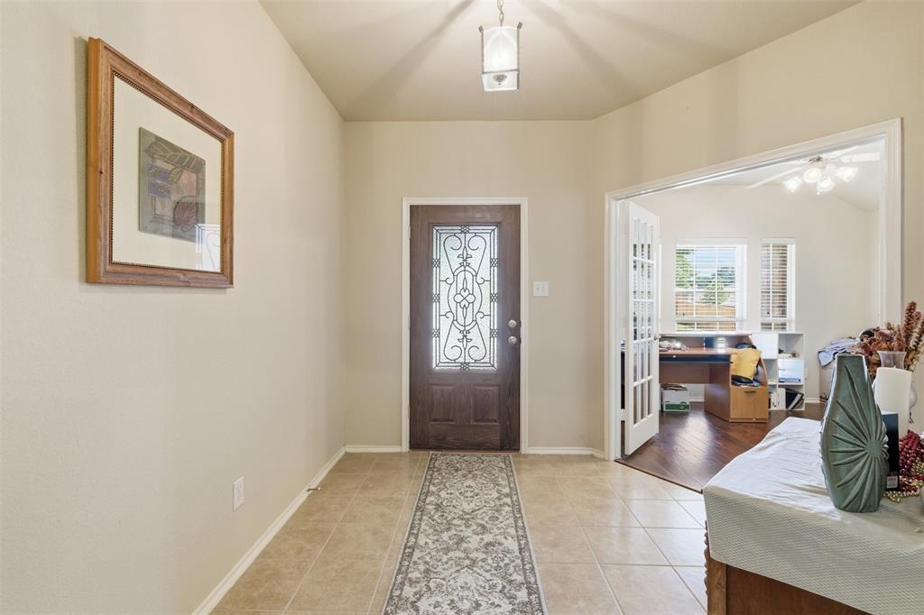 5491 Exeter Drive Prosper, TX 75078 - Photo 10 of 20 a view of a livingroom with furniture and window