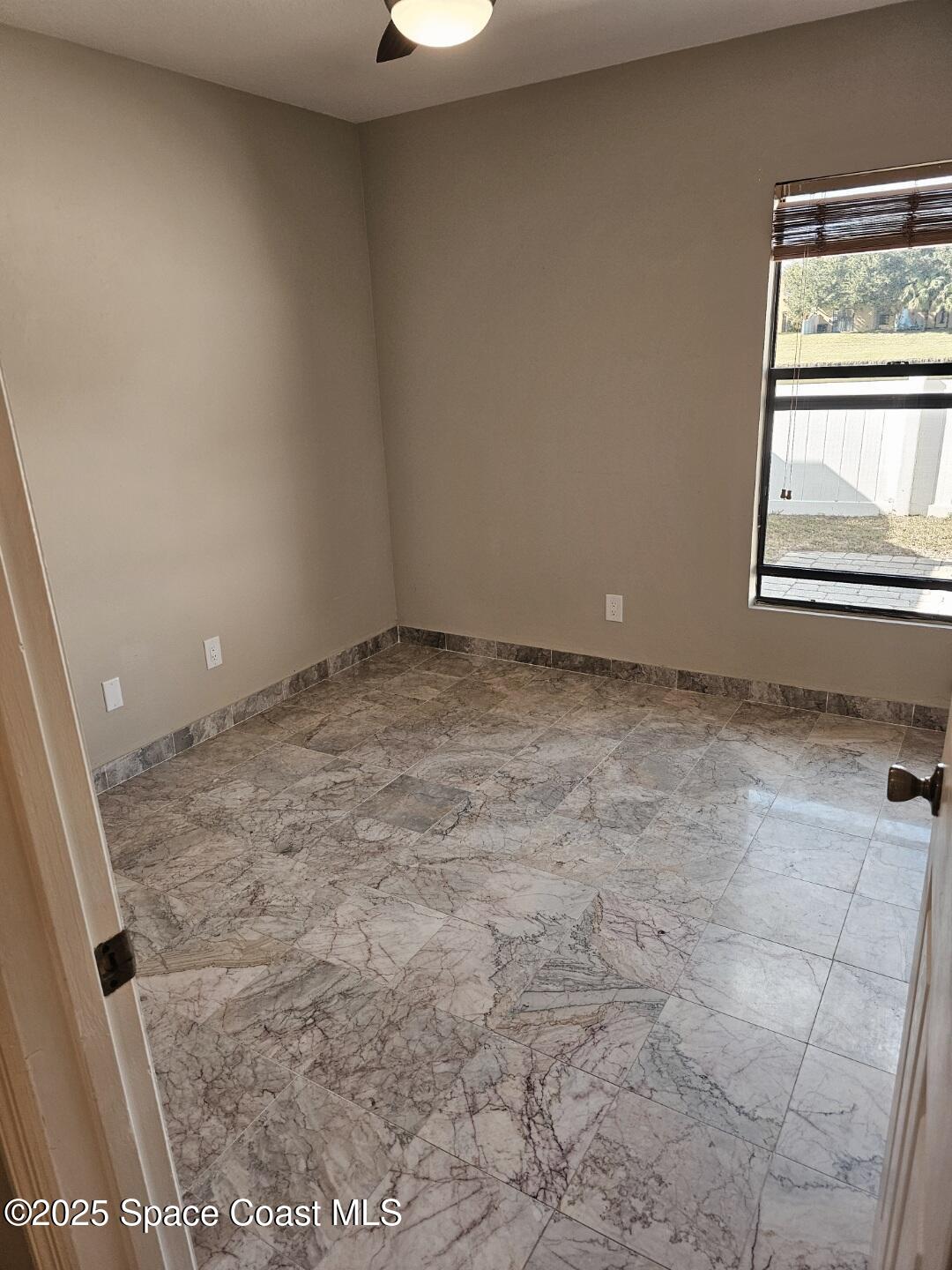 4570 Radiant Way, Unit 104 Melbourne, FL 32901 - Photo 19 of 41 a view of an empty room