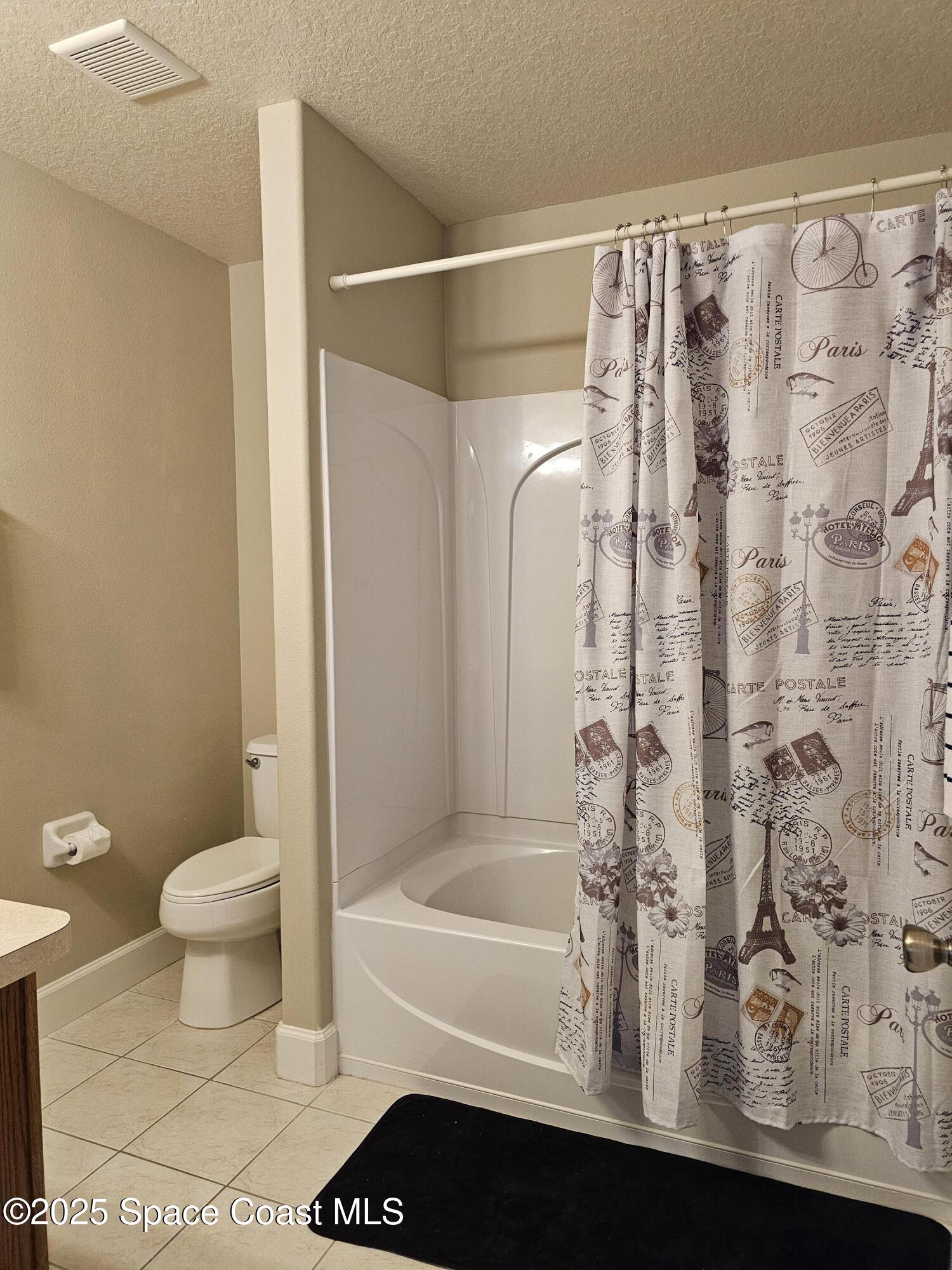 4570 Radiant Way, Unit 104 Melbourne, FL 32901 - Photo 27 of 41 a bathroom with a bathtub and shower