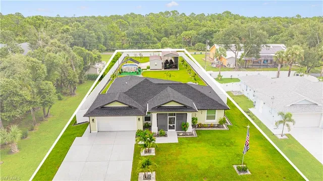 a view of a house with a swimming pool