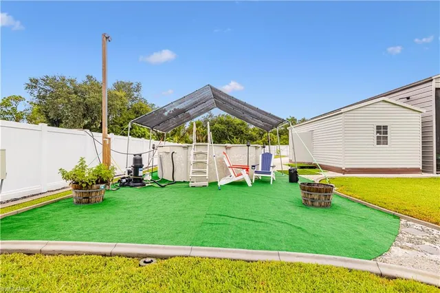 a view of an outdoor space and swimming pool