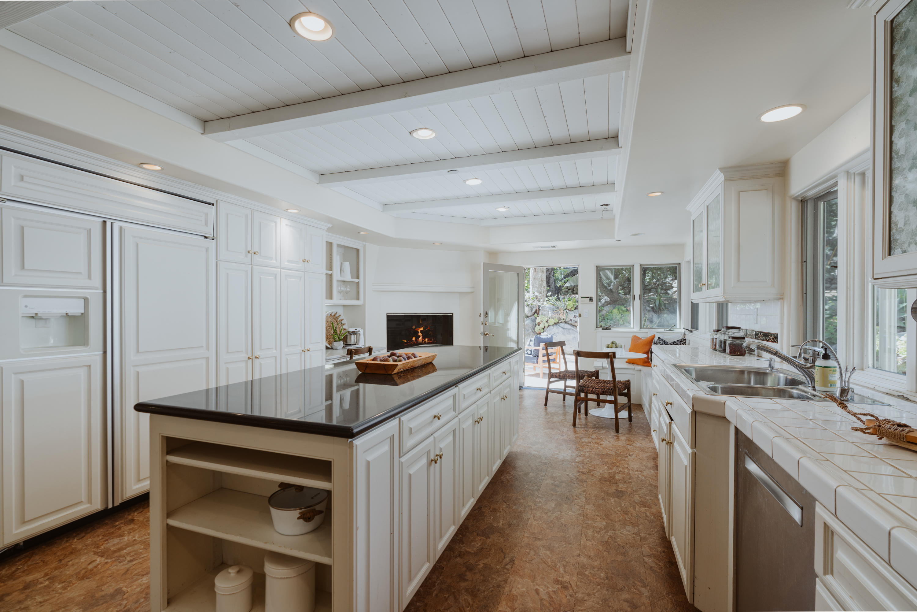 813 Ashley Road Montecito, CA 93108 - Photo 9 of 25 a kitchen that has a lot of cabinets a sink and appliances in it