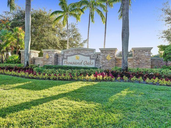 3022 Laurel Ridge Circle Riviera Beach, FL 33404 - Photo 7 of 7 Thousand Oaks Entrance Sign