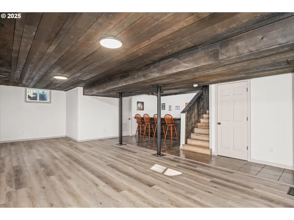 a view of a dining area with furniture and chandelier