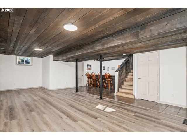 a view of a dining area with furniture and chandelier