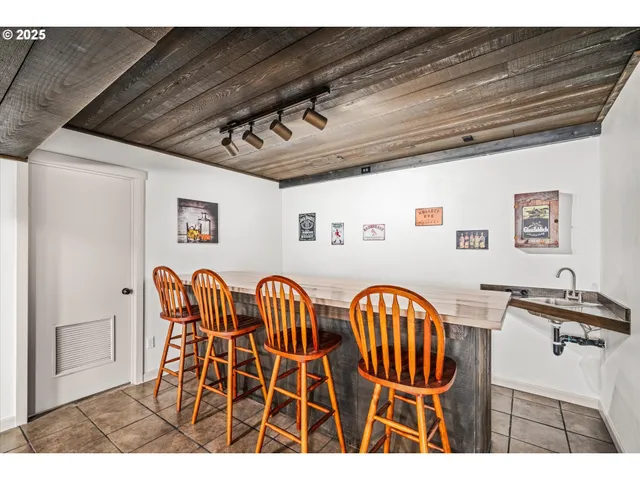 a view of a chairs and table in a room