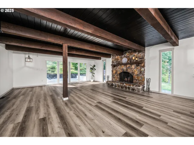 a view of outdoor space and wooden floor