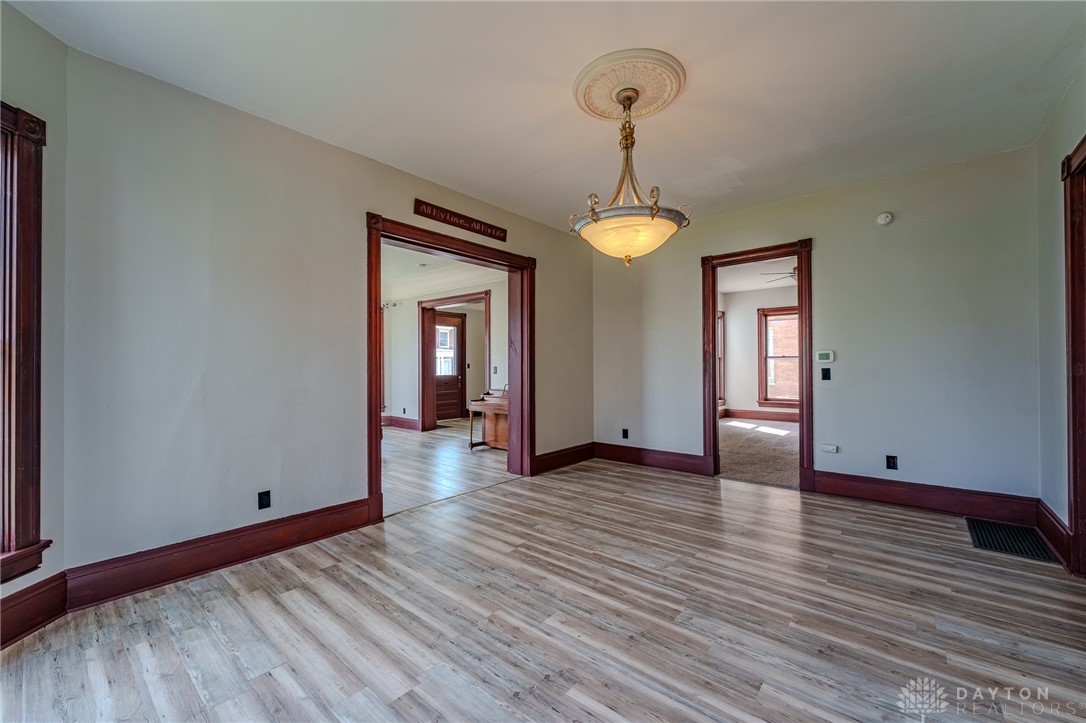 308 Yankee Road Middletown, OH 45044 - Photo 15 of 47 This bright room features durable flooring and classic architectural details, offering an inviting atmosphere.