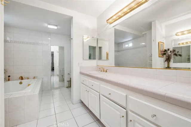 an empty room with a empty space and windows