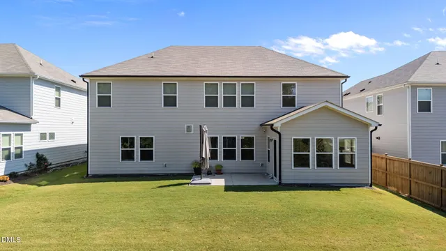 a view of entryway with wooden floor and stairs