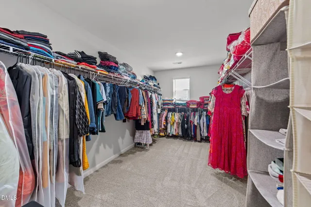 a projector room with furniture projector and screen