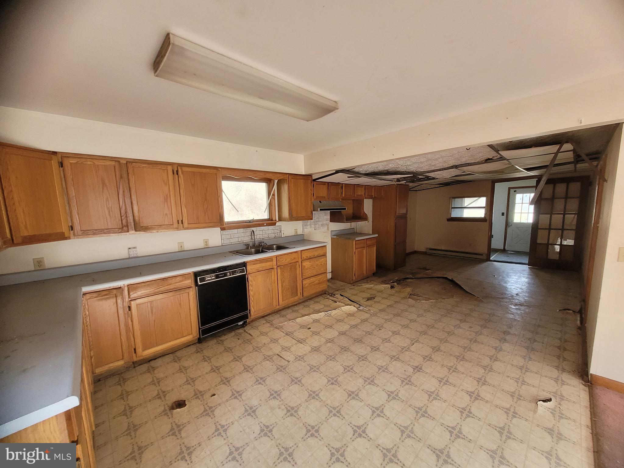 9492 Cumberland Road Springfield, WV 26763 - Photo 12 of 33 a kitchen with a sink and cabinets