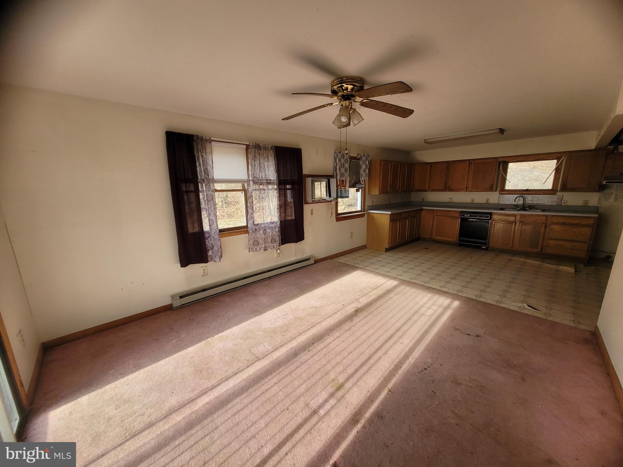 9492 Cumberland Road Springfield, WV 26763 - Photo 16 of 33 a view of a livingroom with a staircase