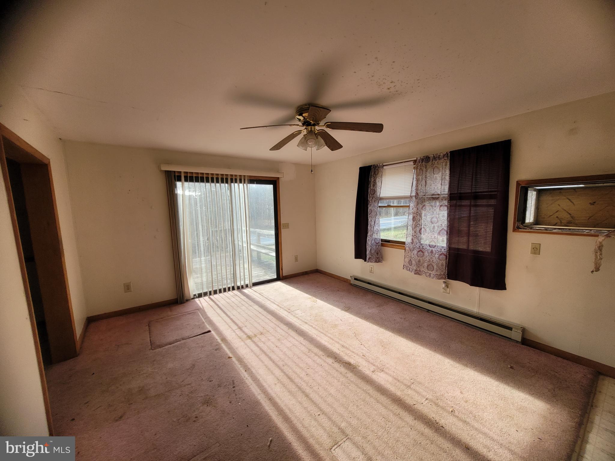 9492 Cumberland Road Springfield, WV 26763 - Photo 17 of 33 a view of an empty room with a window
