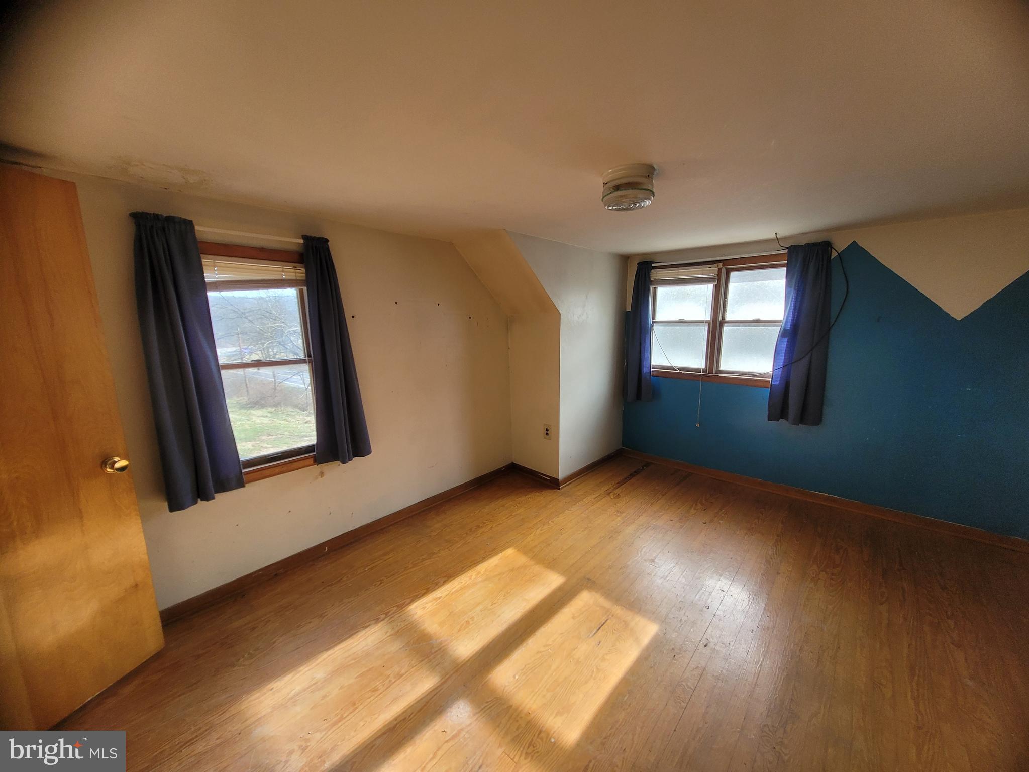 9492 Cumberland Road Springfield, WV 26763 - Photo 30 of 33 a view of an empty room with a window