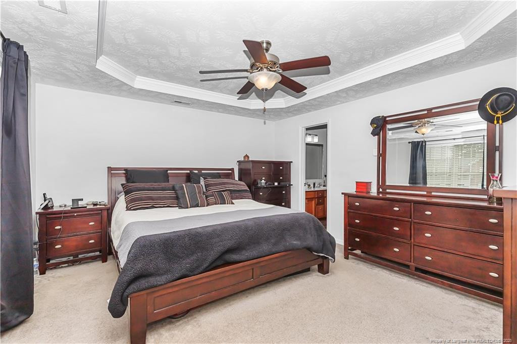 121 Jubilee Court Cameron, NC 28326 - Photo 22 of 36 a bedroom with a bed and a dresser