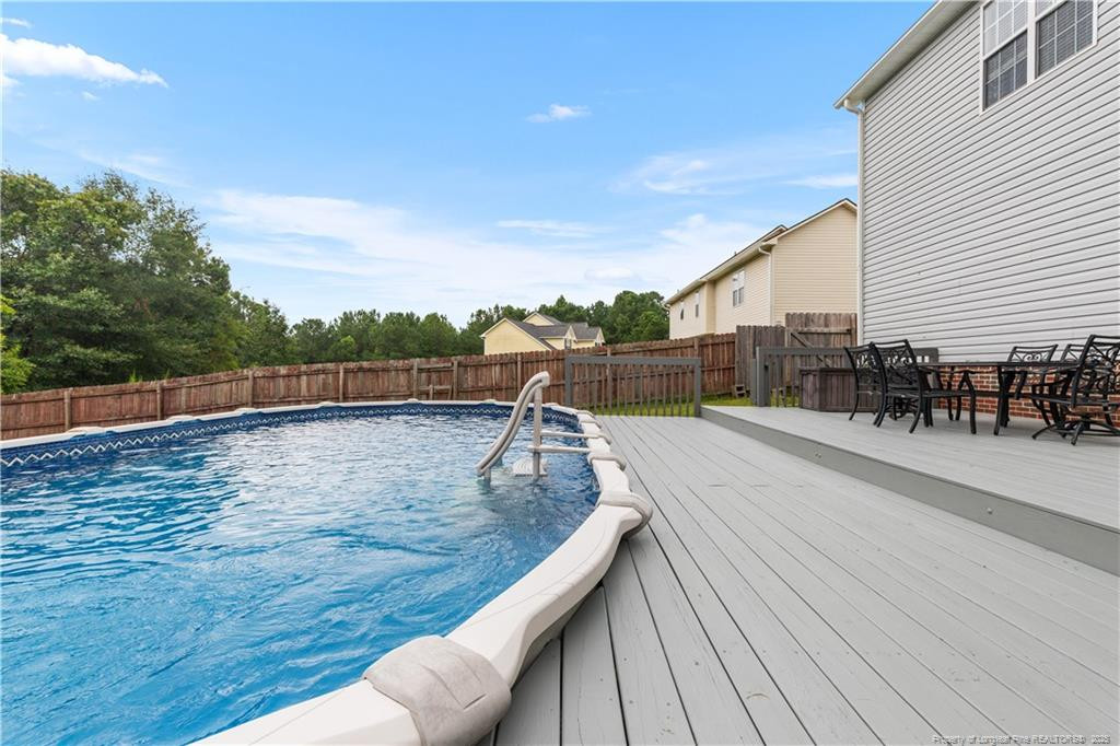 121 Jubilee Court Cameron, NC 28326 - Photo 33 of 36 a view of outdoor space with pool and seating area