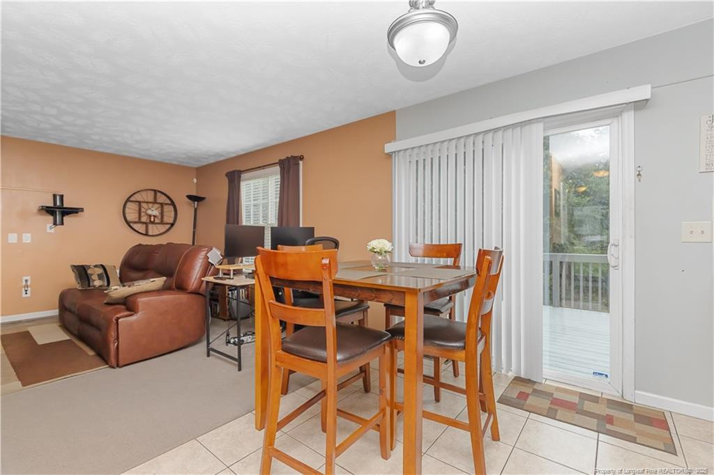 121 Jubilee Court Cameron, NC 28326 - Photo 10 of 36 a view of a livingroom with furniture and window