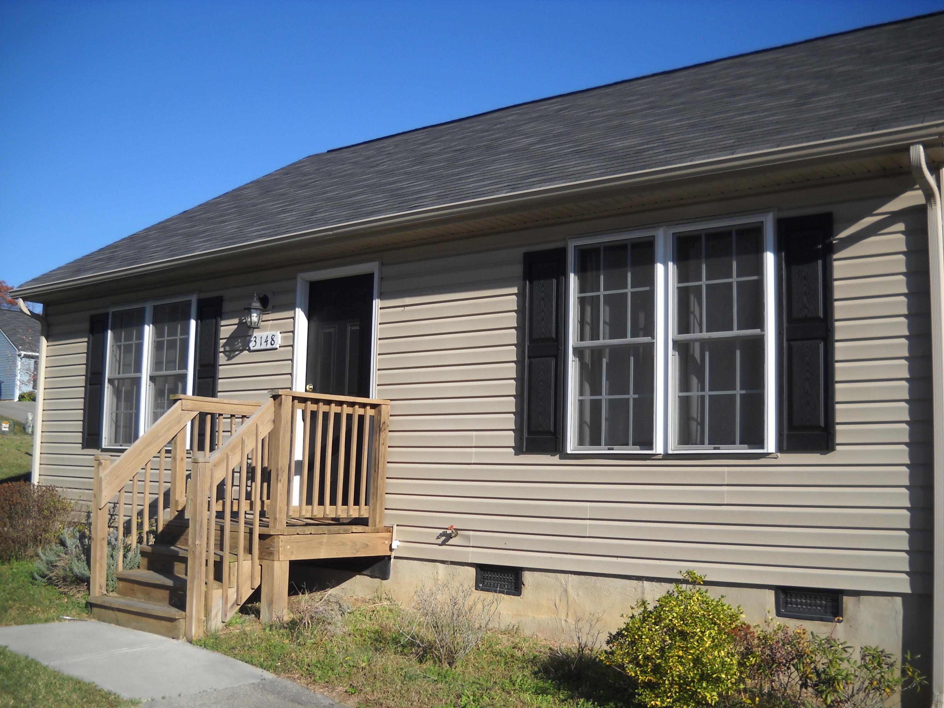 a front view of a house with balcony