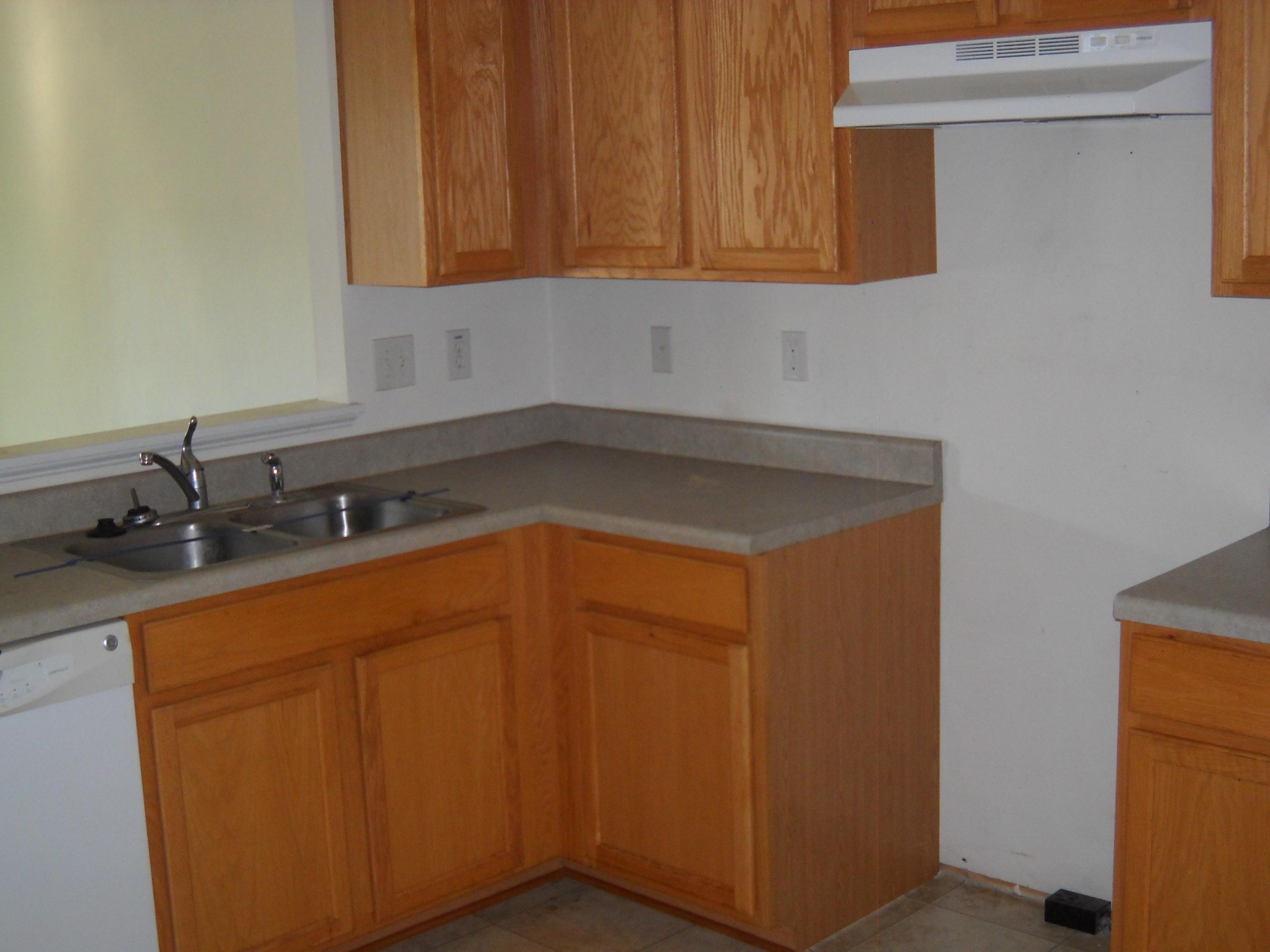 3148 Reed Road Southeast Roanoke, VA 24014 - Photo 2 of 20 a kitchen with a sink and cabinets