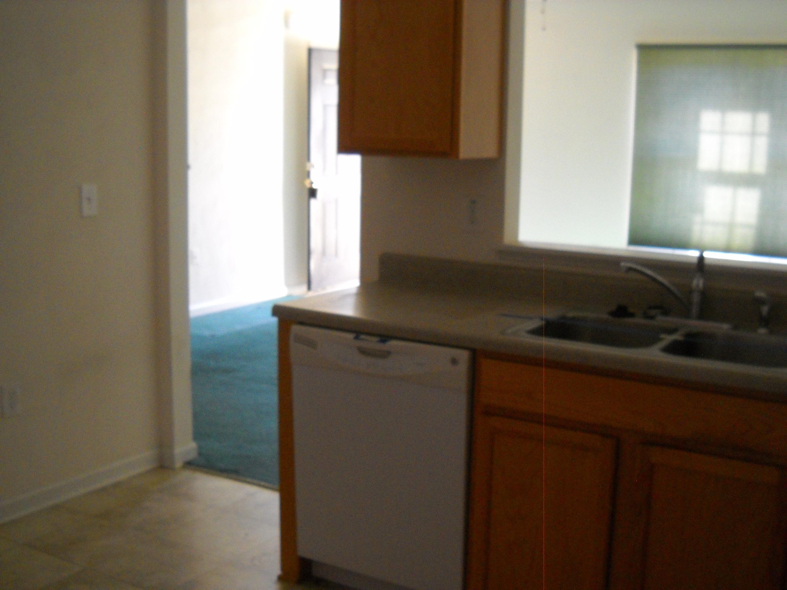 3148 Reed Road Southeast Roanoke, VA 24014 - Photo 3 of 20 a kitchen with a sink and a window