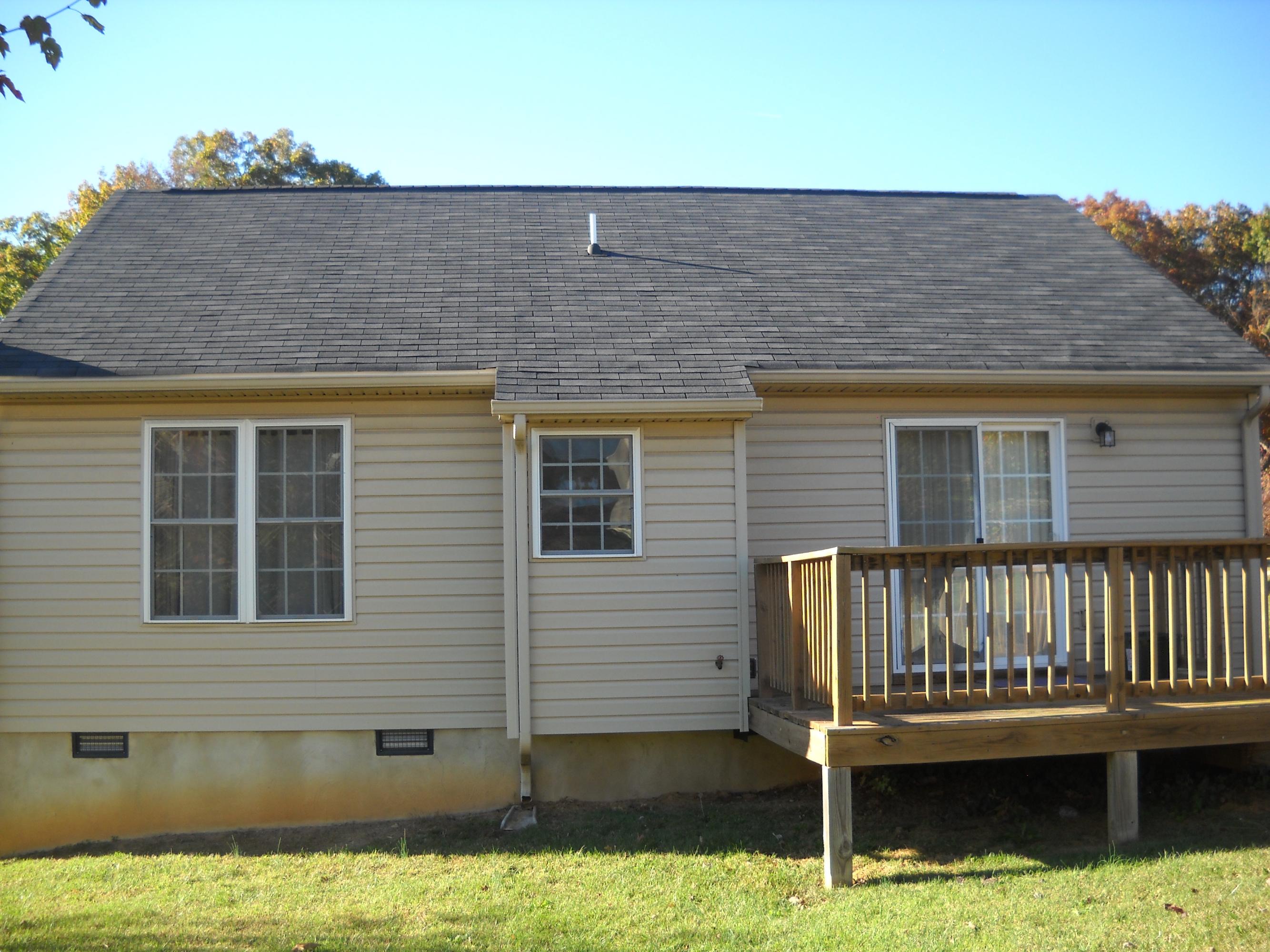 3148 Reed Road Southeast Roanoke, VA 24014 - Photo 8 of 20 a brick house with a large window