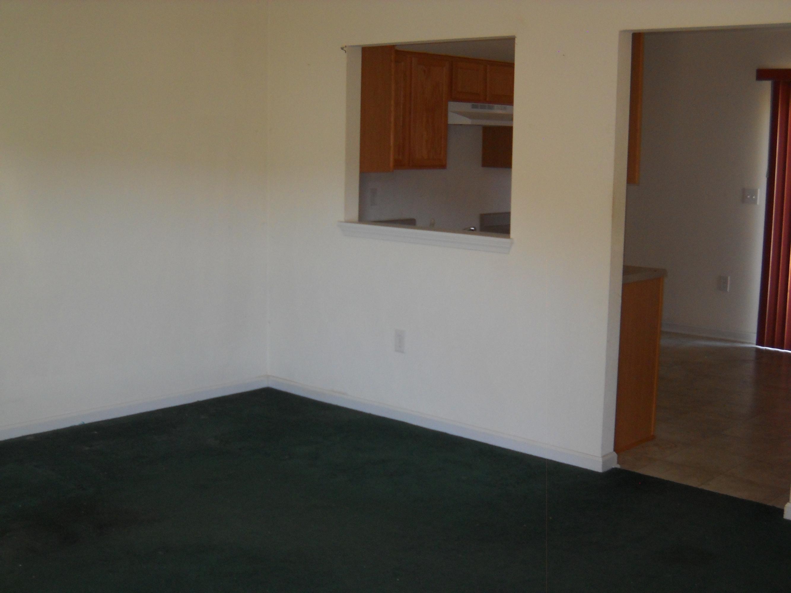 3148 Reed Road Southeast Roanoke, VA 24014 - Photo 9 of 20 a view of a small space with wooden floor and a window