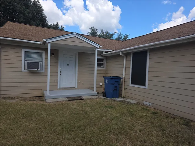 a view of house with an outdoor space