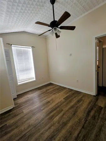 a view of a room with an empty space