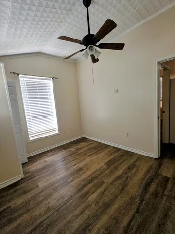 a view of a room with an empty space