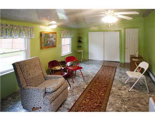 43 Harding Street Old Town, ME 04468 - Photo 4 of 25 Living Room. Long living room on the...