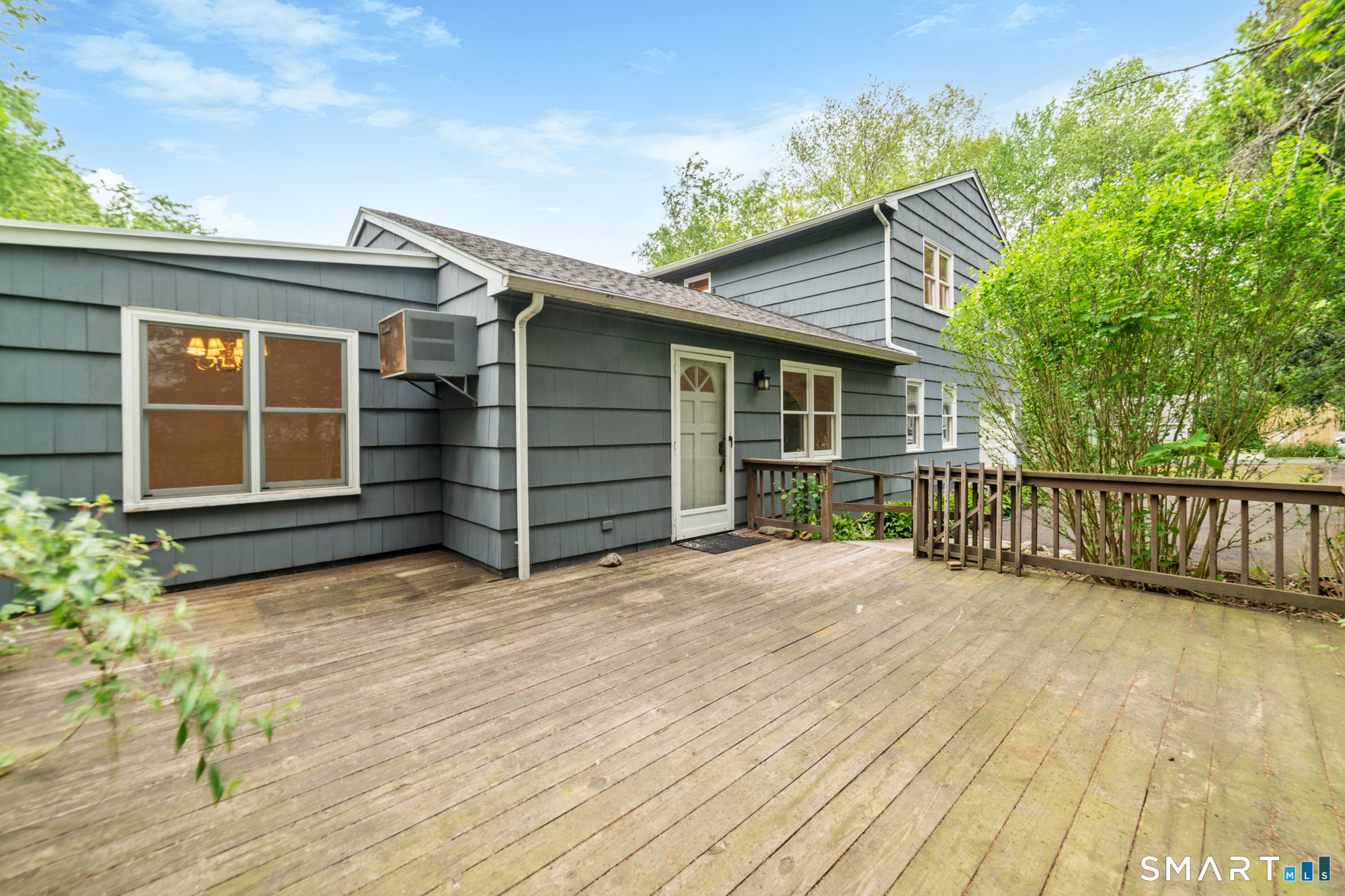 91 Booth Hill Road Shelton, CT 06484 - Photo 24 of 39 Additional living space side private entrance and deck.