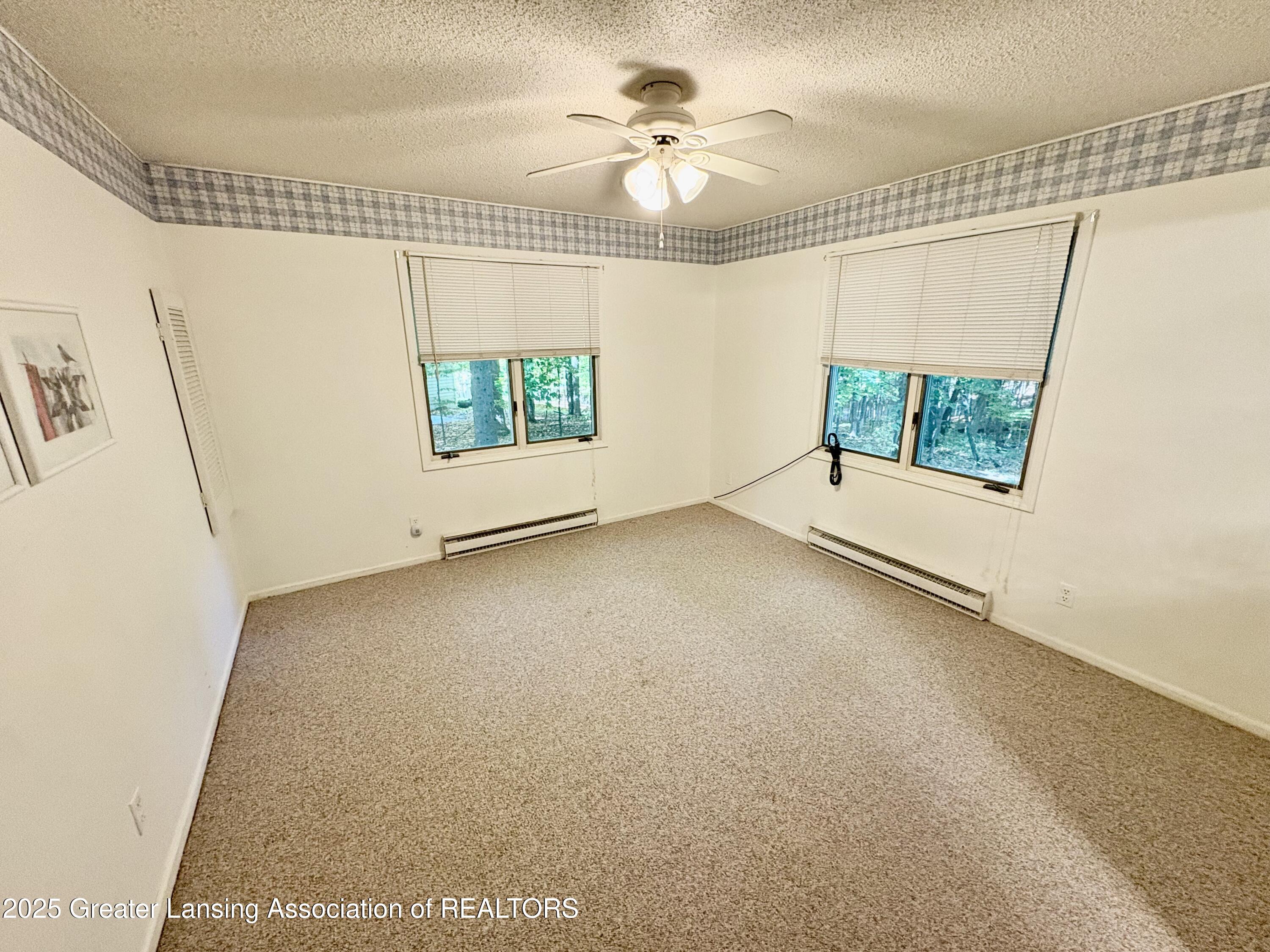 4483 Ridge Run Road Bellaire, MI 49615 - Photo 13 of 37 Primary Bedroom