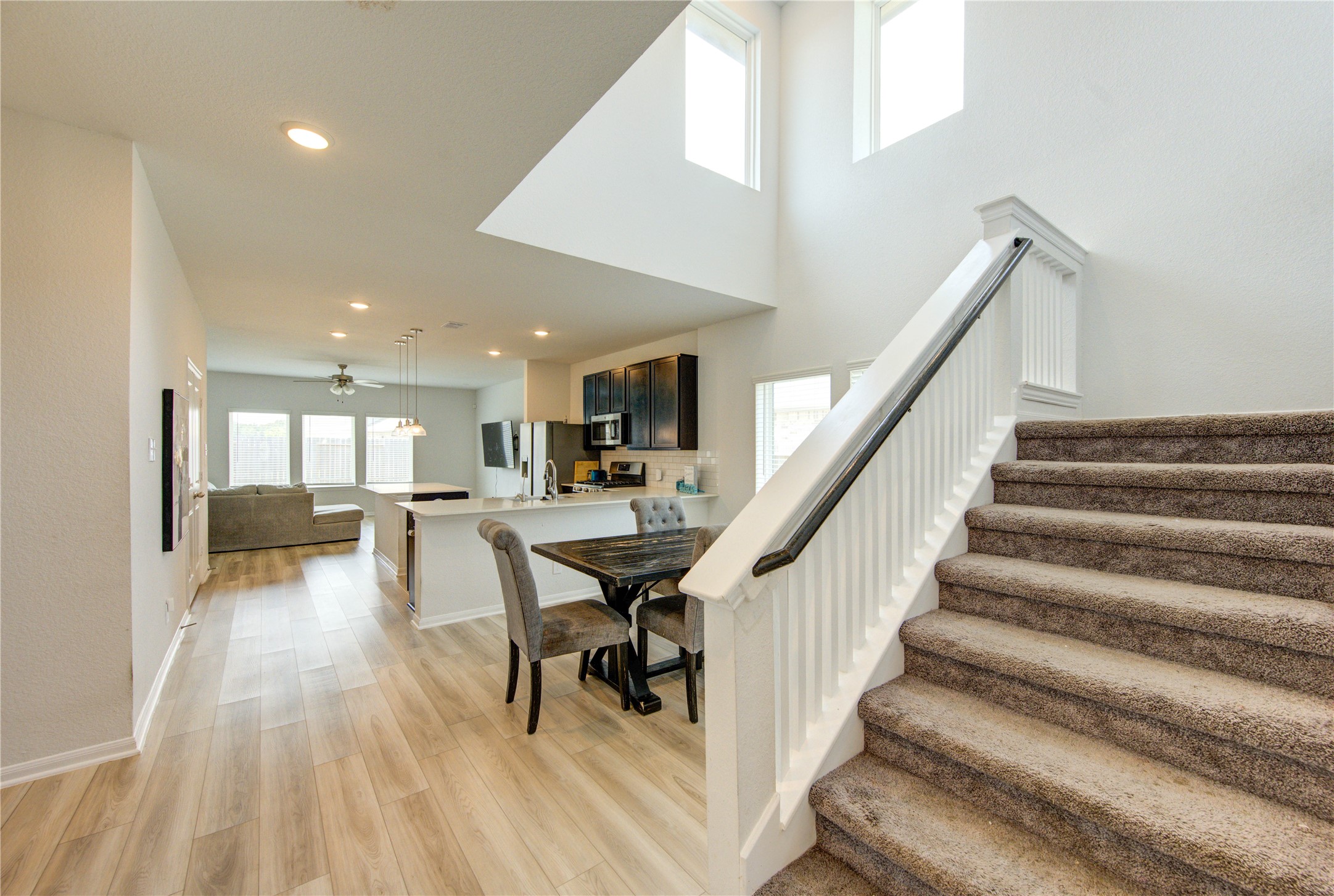 20951 New Proper Drive New Caney, TX 77357 - Photo 11 of 28 a view of entryway and dining room with furniture