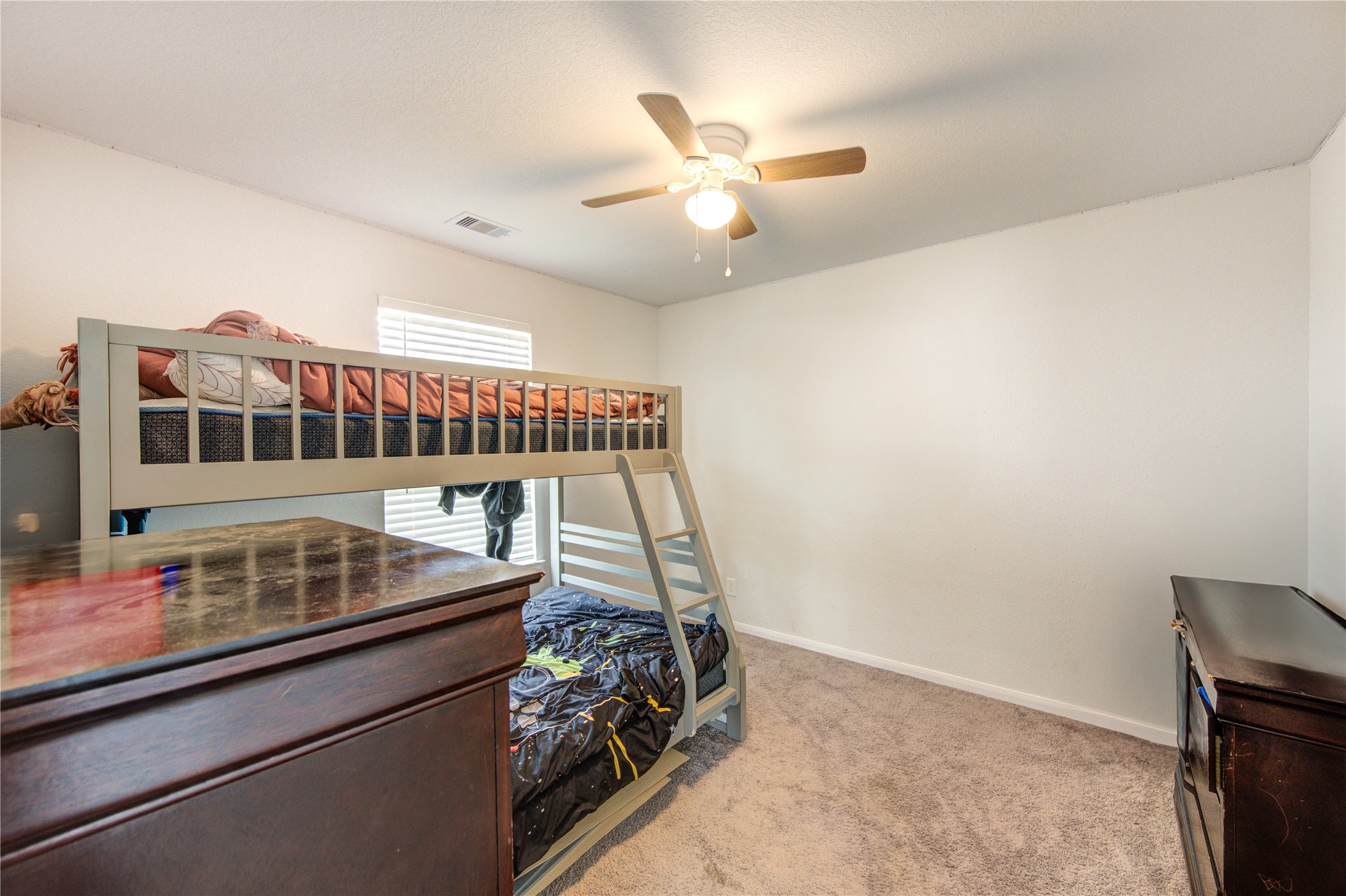 20951 New Proper Drive New Caney, TX 77357 - Photo 15 of 28 a view of an empty room and wooden floor