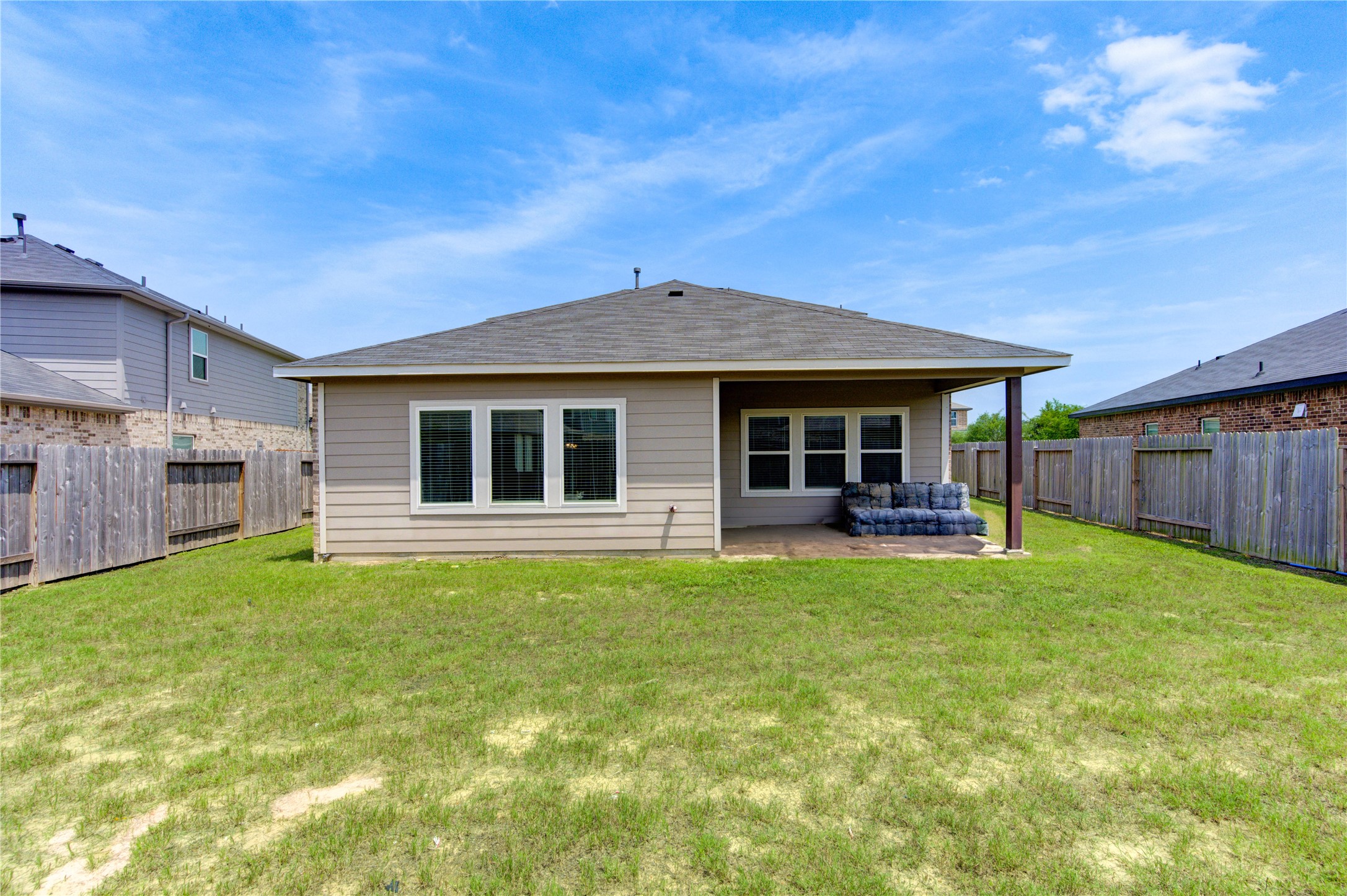 20951 New Proper Drive New Caney, TX 77357 - Photo 26 of 28 a front view of a house with a garden