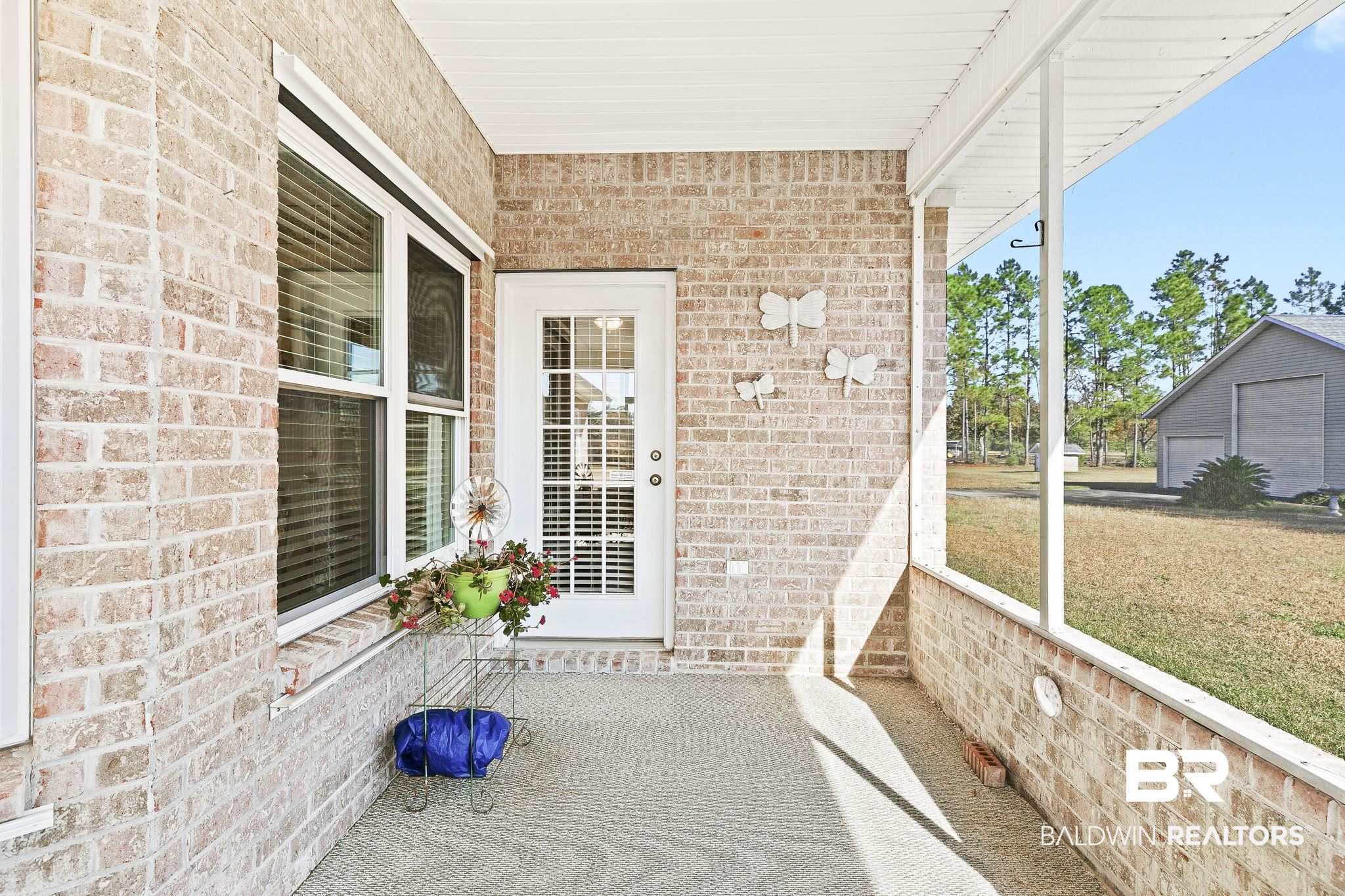 24130 Cowling Road Robertsdale, AL 36567 - Photo 44 of 71 View of unfurnished sunroom