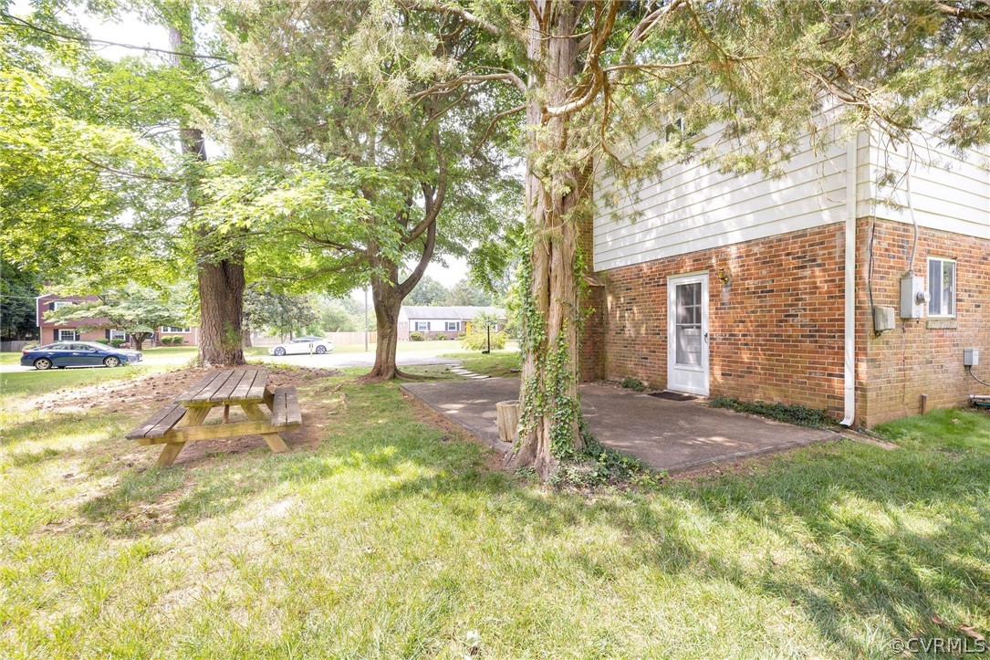 10430 Epsilon Road Richmond, VA 23235 - Photo 23 of 24 Side Door and Driveway