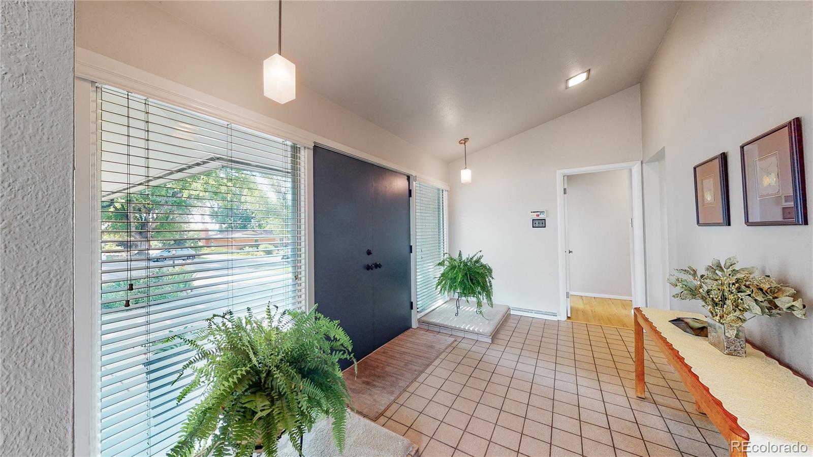 3395 Ward Road Wheat Ridge, CO 80033 - Photo 2 of 39