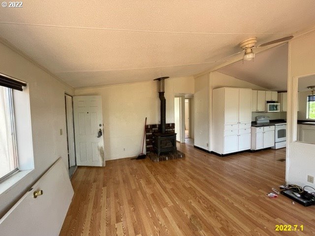 57 Mott Road Lyle, WA 98635 - Photo 12 of 13 a view of a room with wooden floor and furniture