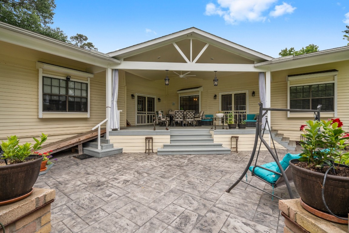 2400 Bowler Road Magnolia, TX 77355 - Photo 11 of 48 a view of house with outdoor seating space