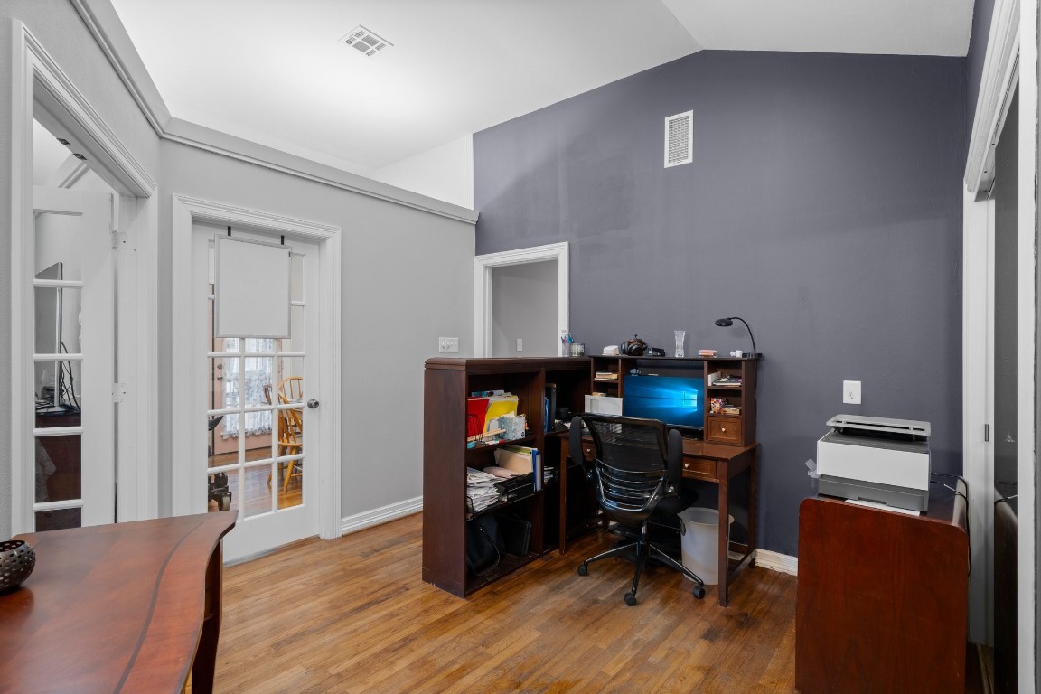 2400 Bowler Road Magnolia, TX 77355 - Photo 26 of 48 a view of a workspace with furniture and wooden floor