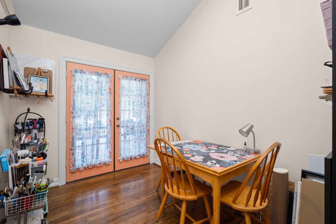 2400 Bowler Road Magnolia, TX 77355 - Photo 27 of 48 a dining room with furniture and wooden floor