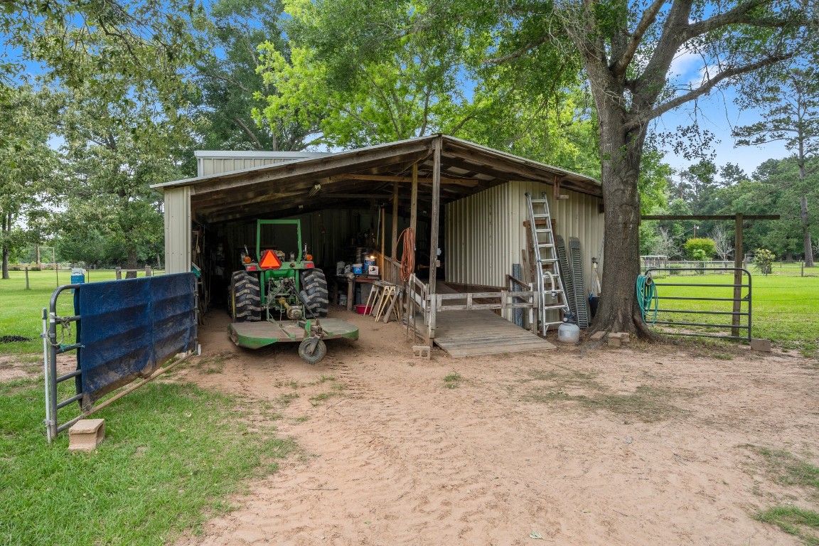 2400 Bowler Road Magnolia, TX 77355 - Photo 40 of 48 a view of backyard and wooden fence