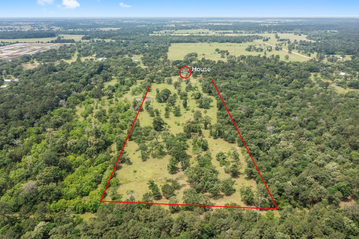 2400 Bowler Road Magnolia, TX 77355 - Photo 42 of 48 an aerial view of residential houses with outdoor space and trees
