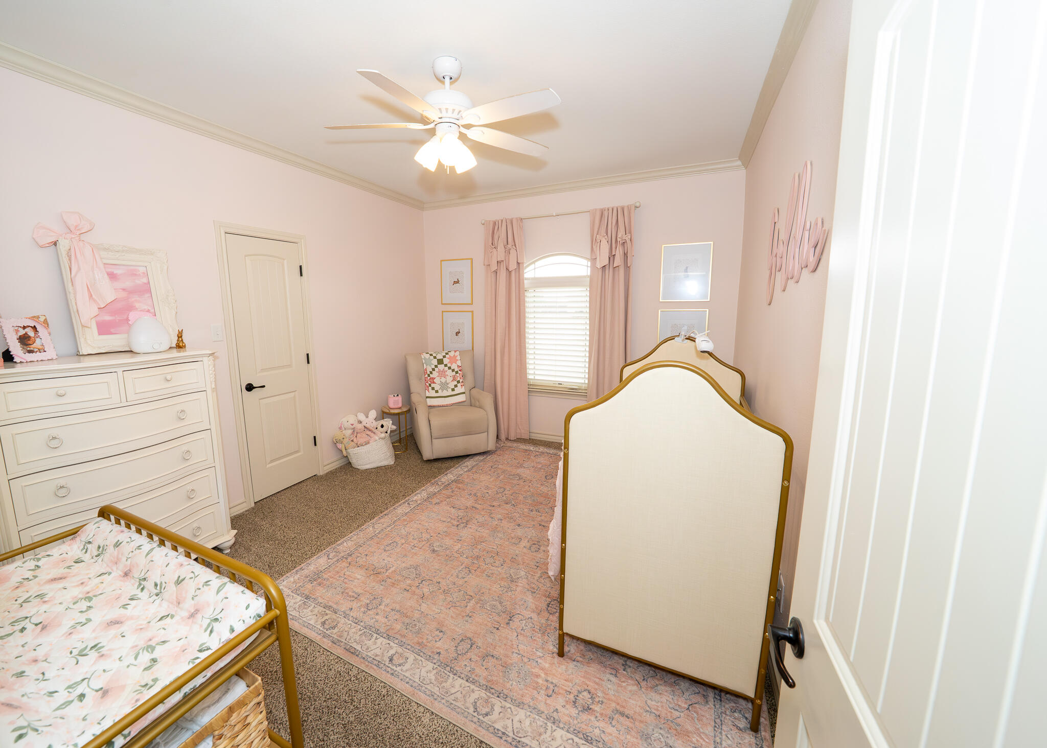 3301 County Road 7560 Lubbock, TX 79423 - Photo 27 of 40 a view of a bedroom with wooden floor and cabinet