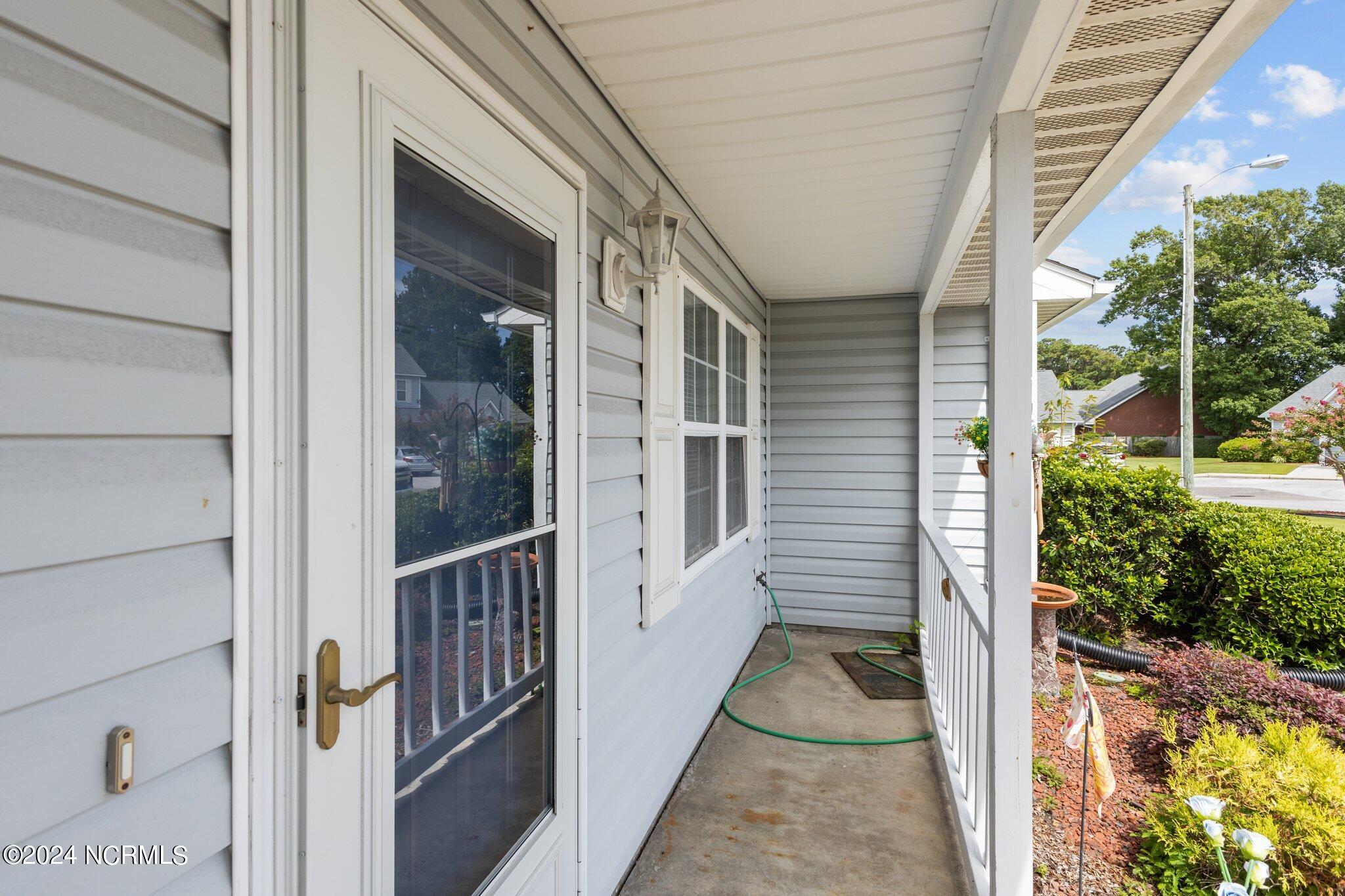 303 Barbour Road, Unit 1102 Morehead City, NC 28557 - Photo 5 of 44 Covered porch