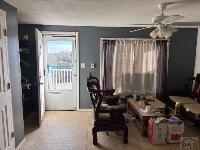 490 A Street Penrose, CO 81240 - Photo 20 of 46 a view of a workspace with furniture and a window